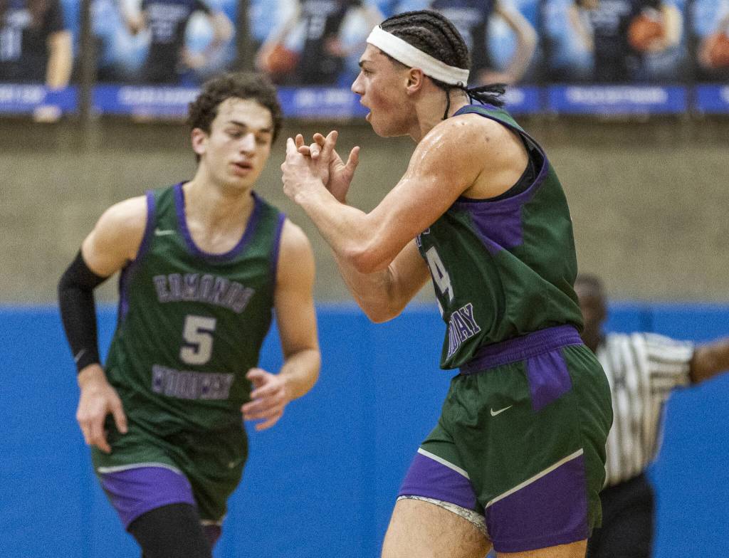 Edmonds-Woodways Julian Gray celebrates his score during the game against Shorewood on Tuesday, Feb. 4, 2025 in Shoreline, Washington. (Olivia Vanni / The Herald)