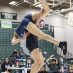 Kamiaks Kai Burgess flips Arlingtons Jaymari ONeal over her back during the 125-pound match at the 4A girls wrestling district tournament on Friday, Feb. 7, 2025 in Mill Creek, Washington. (Olivia Vanni / The Herald)