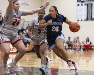Meadowdale’s Kyairra Roussin takes the ball to the hoop during the game against Archbishop Murphy on Thursday, Jan. 30, 2025 in Everett, Washington. (Olivia Vanni / The Herald)