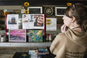 Jasmine Donahue talks about being a place for people leave messages when looking for family members, friends or loved ones on the street on Thursday, Jan. 9, 2025 in Everett, Washington. (Olivia Vanni / The Herald)