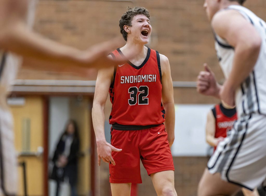 Snohomishs Jack Rotondo yells in celebration during the 3A district loser-out playoff game against Mountlake Terrace on Thursday, Feb. 13, 2025 in Mountlake Terrace, Washington. (Olivia Vanni / The Herald)