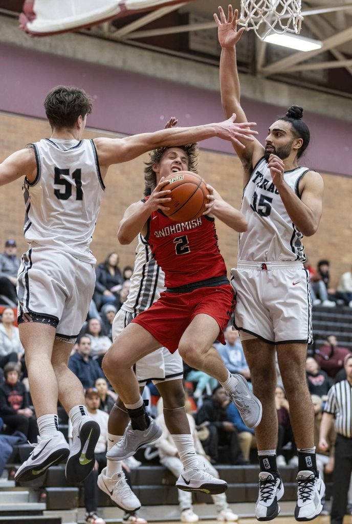 Snohomishs Bryson Wheat is fouled while attempting a layup during the 3A district loser-out playoff game Mountlake Terrace on Thursday, Feb. 13, 2025 in Mountlake Terrace, Washington. (Olivia Vanni / The Herald)