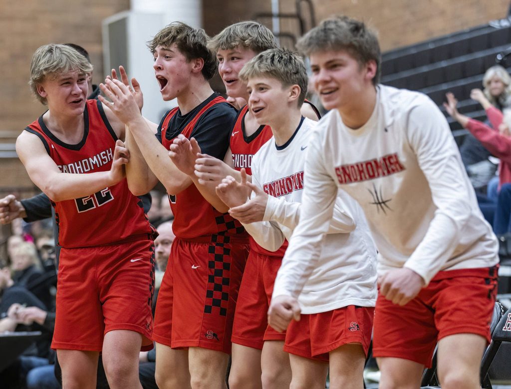 The Snohomish bench reacts to a foul call during the 3A district loser-out playoff game against Mountlake Terrace on Thursday, Feb. 13, 2025 in Mountlake Terrace, Washington. (Olivia Vanni / The Herald)