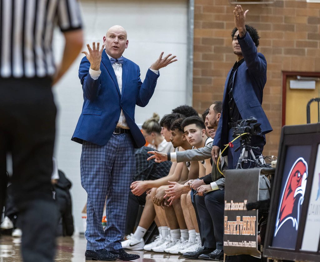 Mountlake Terrace head coach Johnny Phillips gestures at the referees in confusion after a foul call during the 3A district loser-out playoff game against Snohomish on Thursday, Feb. 13, 2025 in Mountlake Terrace, Washington. (Olivia Vanni / The Herald)