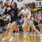 Shorewoods Vanessa Spadafora fakes out Shorecrests Jorja Perrin to get a clear jump shot a during the 3A district playoff game on Friday, Feb. 14, 2025 in Shoreline, Washington. (Olivia Vanni / The Herald)