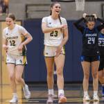 Shorecrests Jorja Perrin and Cassie Chesnut laugh as they pull ahead of Shorewood in the final second of the 3A district playoff game on Friday, Feb. 14, 2025 in Shoreline, Washington. (Olivia Vanni / The Herald)