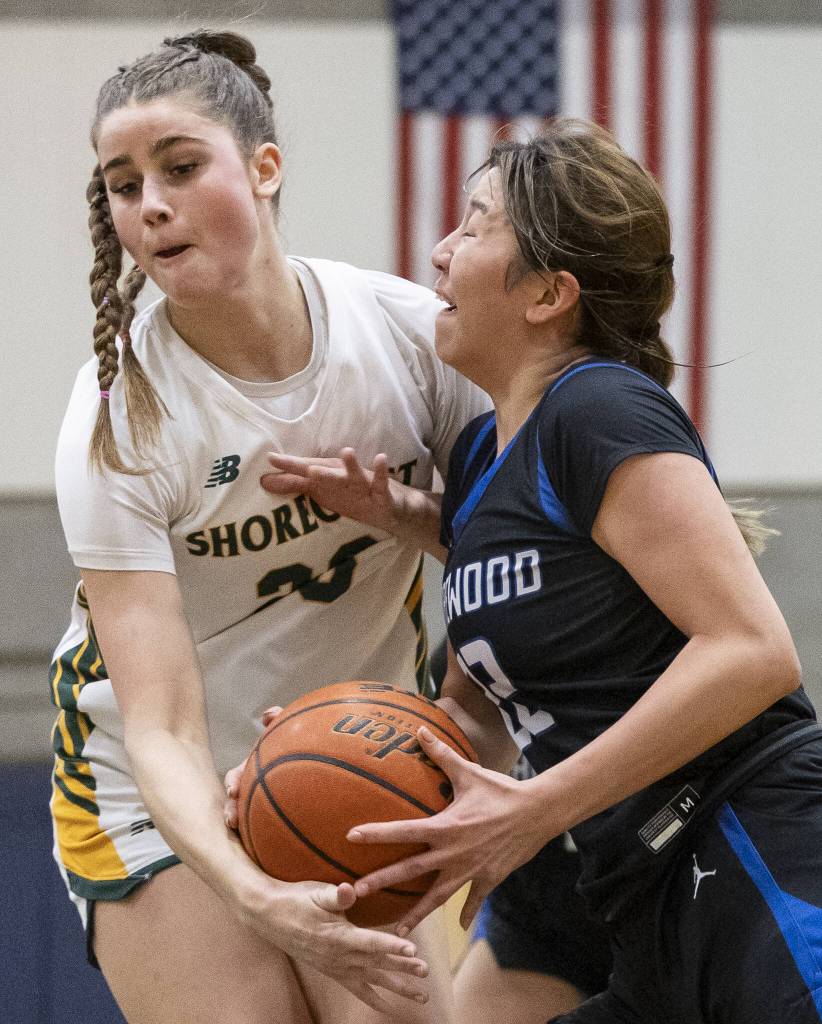 Shorecrests Cassie Chesnut steals the ball away from Shorewoods Clara Djohan during the 3A district playoff game on Friday, Feb. 14, 2025 in Shoreline, Washington. (Olivia Vanni / The Herald)