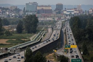 Afternoon traffic moves along the U.S. 2 trestle between Everett and Lake Stevens on Thursday, Aug. 12, 2021 in Everett, Wash. (Olivia Vanni / The Herald)