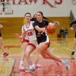 Monroe junior Mya Mercille receives a pass in the Girls 3A Basketball District 1 semifinals against Stanwood at Marysville Pilchuck High School in Marysville, Washington on Feb. 18, 2025. (Joe Pohoryles / The Herald)