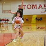 Shorecrest senior Cassie Chesnut jumps while anticipating a shot attempt from Snohomish senior Tyler Gildersleeve-Stiles in the Girls 3A Basketball District 1 semifinals at Marysville Pilchuck High School in Marysville, Washington on Feb. 18, 2025. (Joe Pohoryles / The Herald)