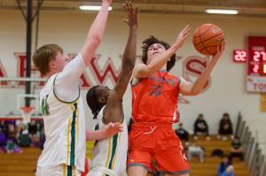 Monroe senior Dylan Hall (10) elevates for a layup against Shorecrest in the District 1 Boys 3A Basketball Semifinals in Marysville, Washington on Feb. 19, 2025. (Joe Pohoryles / The Herald)