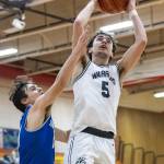 Edmonds-Woodways Cam Hiatt makes a layup during the 3A district semifinal game against Shorewood on Wednesday, Feb. 19, 2025 in Marysville, Washington. (Olivia Vanni / The Herald)