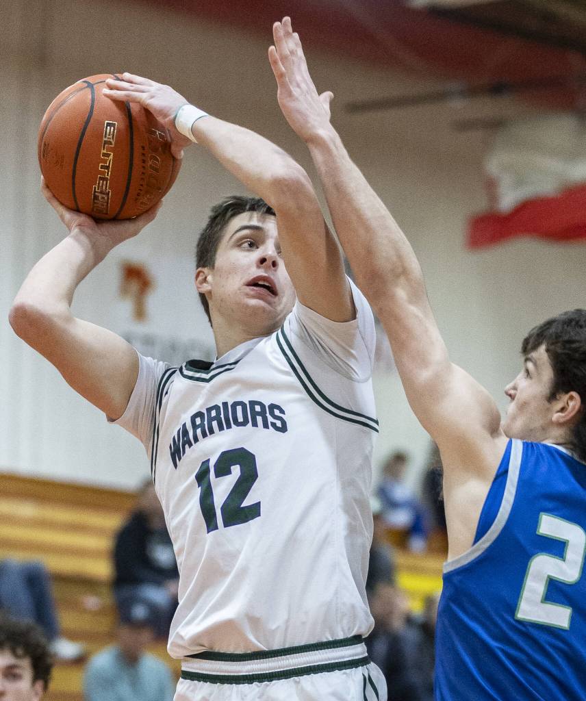 Edmonds-Woodways William Alseth makes a layup during the 3A district semifinal game against Shorewood on Wednesday, Feb. 19, 2025 in Marysville, Washington. (Olivia Vanni / The Herald)