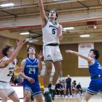 Edmonds-Woodways Cam Hiatt makes a layup during the 3A district semifinal game on Wednesday, Feb. 19, 2025 in Marysville, Washington. (Olivia Vanni / The Herald)