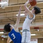Edmonds-Woodways Luke Boland makes a jump shot during the 3A district semifinal game against Shorewood on Wednesday, Feb. 19, 2025 in Marysville, Washington. (Olivia Vanni / The Herald)