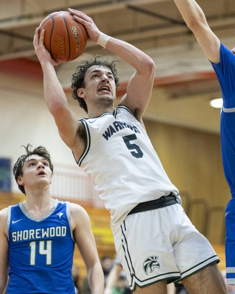 Edmonds-Woodways Cam Hiatt makes a layup during the 3A district semifinal game against Shorewood on Wednesday, Feb. 19, 2025 in Marysville, Washington. (Olivia Vanni / The Herald)