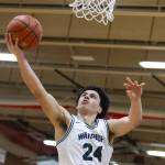 Edmonds-Woodways Julian Gray makes a layup during the 3A district semifinal game against Shorewood on Wednesday, Feb. 19, 2025 in Marysville, Washington. (Olivia Vanni / The Herald)