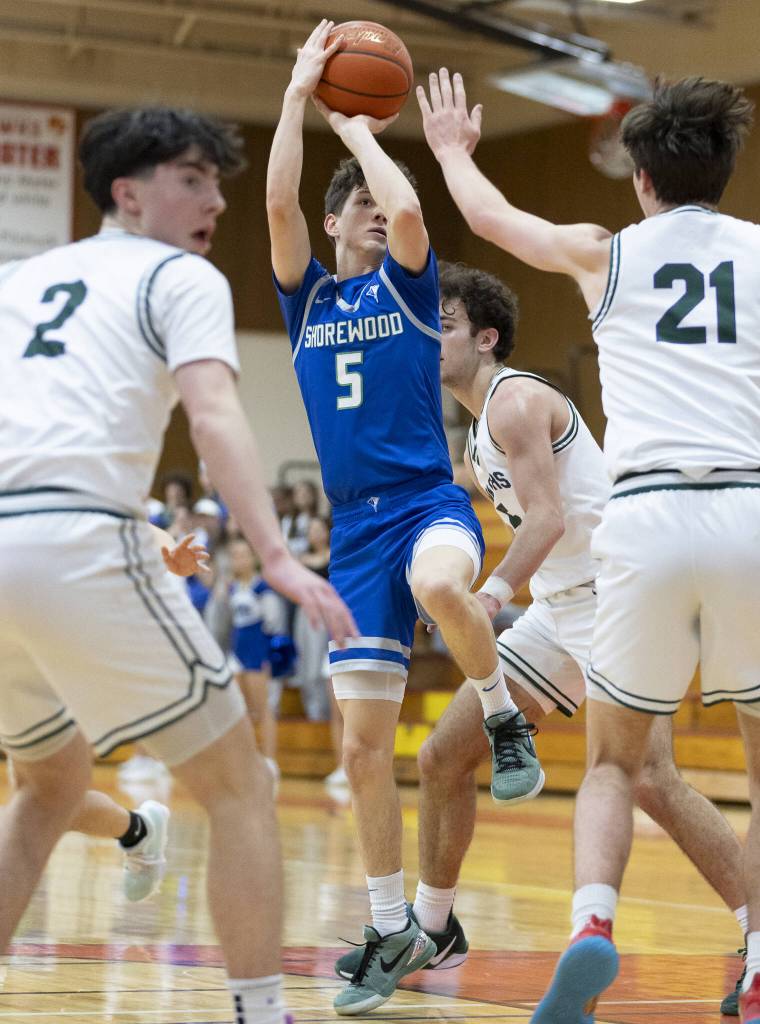 Shorewoods Thomas Moles makes a jump shot during the 3A district semifinal game against Edmonds-Woodway on Wednesday, Feb. 19, 2025 in Marysville, Washington. (Olivia Vanni / The Herald)