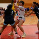 Snohomishs Tyler Gildersleeve-Stiles is double-teamed by Meadowdale defenders during a Feb. 22, 2025 District 1 3A playoff game at Marysville Pilchuck High School. (Qasim Ali / The Herald)