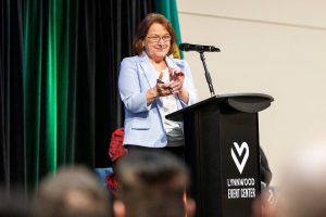 Lynnwood Mayor Christine Frizzell claps as she recognizes some of her constituents during her State of the City address at the Lynnwood Event Center on Wednesday, Feb. 26, 2025 in Lynnwood, Washington. (Olivia Vanni / The Herald)
