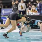 Jacksons Emily Ortiz gets control of her opponents leg during the 4A girls 145-pound championship match at the Mat Classic on Friday, Feb. 21, 2025 in Tacoma, Washington. (Olivia Vanni / The Herald)