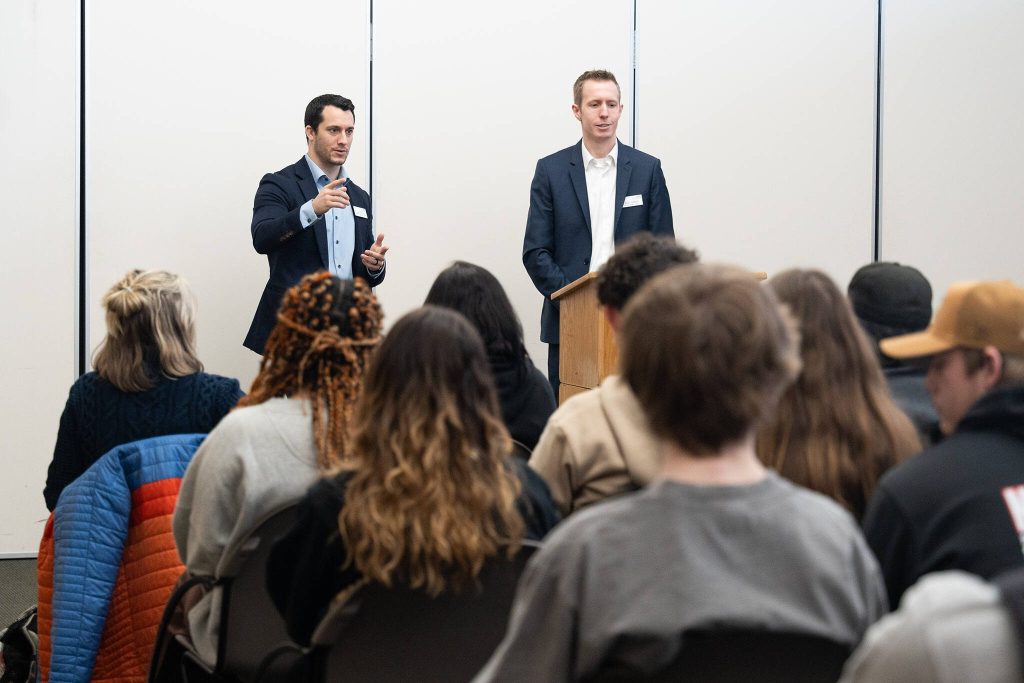 County Council members Jared Mead, left, and Nate Nehring speak to students on Friday, Jan. 31 during 'Civic Education Day' at the Snohomish County Campus in Everett, Washington. (Will Geschke / The Herald)
