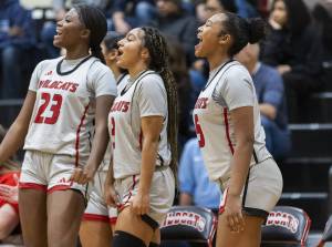 The Archbishop Murphy bench reacts to a shot during the game against Meadowdale on Thursday, Jan. 30, 2025 in Everett, Washington. (Olivia Vanni / The Herald)