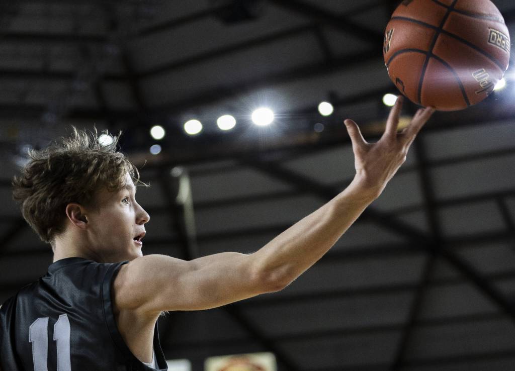 Glacier Peaks Reed Nagel reaches out for a loose ball during the 4A boys semifinal game against Gonzaga Prep on Friday, March 7, 2025 in Tacoma, Washington. (Olivia Vanni / The Herald)