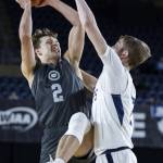 Glacier Peaks Jo Lee tries to get a shot off while being guarded by Gonzaga Preps Veer Nagra during the 4A boys semifinal game against Gonzaga Prep on Friday, March 7, 2025 in Tacoma, Washington. (Olivia Vanni / The Herald)