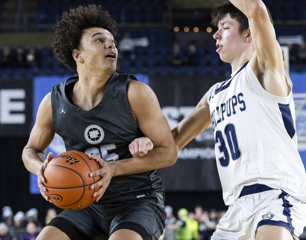Glacier Peaks Jayce Nelson looks for an open shot during the 4A boys semifinal game against Gonzaga Prep on Friday, March 7, 2025 in Tacoma, Washington. (Olivia Vanni / The Herald)