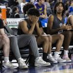 The Glacier Peak bench reacts to Gonzaga Prep taking the lead during the 4A boys semifinal game on Friday, March 7, 2025 in Tacoma, Washington. (Olivia Vanni / The Herald)