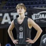 Glacier Peaks Reed Nagel looks up at scoreboard as he walks off the court after fouling out during the 4A boys semifinal game against Gonzaga Prep on Friday, March 7, 2025 in Tacoma, Washington. (Olivia Vanni / The Herald)