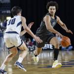 Glacier Peaks Jayce Nelson takes the ball down the court during the 4A boys semifinal game against Gonzaga Prep on Friday, March 7, 2025 in Tacoma, Washington. (Olivia Vanni / The Herald)