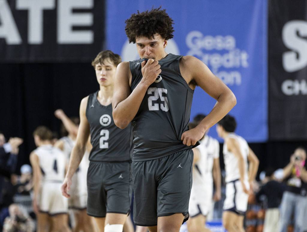 Glacier Peaks Jayce Nelson becomes emotional while walking off the court after losing to Gonzaga Prep in the 4A boys semifinal game on Friday, March 7, 2025 in Tacoma, Washington. (Olivia Vanni / The Herald)