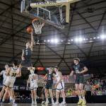 Glacier Peaks Jo Lee leaps in the air to make a shot during the 4A boys semifinal game against Gonzaga Prep on Friday, March 7, 2025 in Tacoma, Washington. (Olivia Vanni / The Herald)