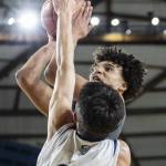 Glacier Peaks Jayce Nelson tries to take a jump shot while being guarded by Gonzaga Preps Carter Nelson during the 4A boys semifinal game on Friday, March 7, 2025 in Tacoma, Washington. (Olivia Vanni / The Herald)