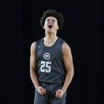 Glacier Peaks Jayce Nelson reacts to his teammate making a three-point shot during the 4A boys semifinal game against Gonzaga Prep on Friday, March 7, 2025 in Tacoma, Washington. (Olivia Vanni / The Herald)
