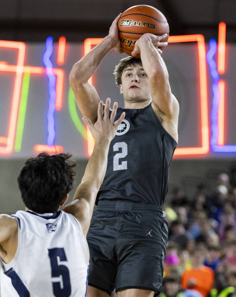 Glacier Peaks Jo Lee takes a jump shot during the 4A boys semifinal game against Gonzaga Prep on Friday, March 7, 2025 in Tacoma, Washington. (Olivia Vanni / The Herald)