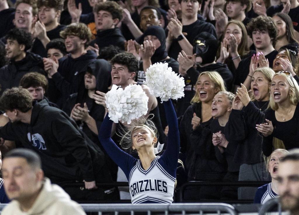 Glacier Peak fans react to a score during the 4A boys quarterfinal game against Camas on Thursday, March 6, 2025 in Tacoma, Washington. (Olivia Vanni / The Herald)