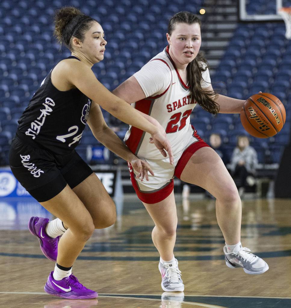 Stanwoods Jazmyn Legg takes the ball to the basket during the 3A girls quarterfinal game against Garfield on Thursday, March 6, 2025 in Tacoma, Washington. (Olivia Vanni / The Herald)