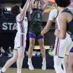 Edmonds-Woodways Cameron Hiatt makes a three-point shot during the 3A boys semifinal game against Mt. Spokane on Friday, March 7, 2025 in Tacoma, Washington. (Olivia Vanni / The Herald)