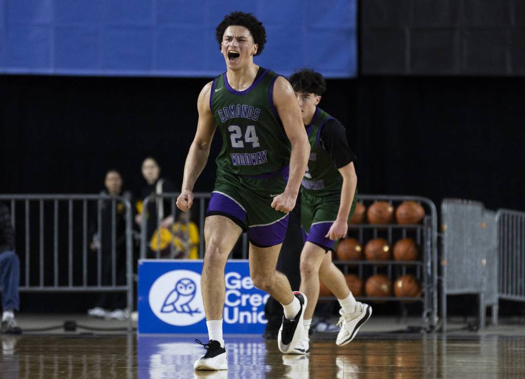 Edmonds-Woodways Julian Gray reacts to Mt. Spokane calling a timeout during the 3A boys semifinal game on Friday, March 7, 2025 in Tacoma, Washington. (Olivia Vanni / The Herald)