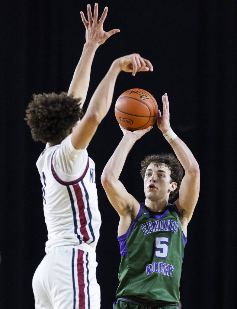 Edmonds-Woodways Cameron Hiatt takes a jump shot during the 3A boys semifinal game against Mt. Spokane on Friday, March 7, 2025 in Tacoma, Washington. (Olivia Vanni / The Herald)