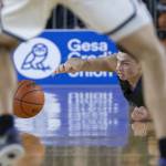 Edmonds-Woodways Julian Gray scrambles on the ground for a loose ball during the 3A boys semifinal game against Mt. Spokane on Friday, March 7, 2025 in Tacoma, Washington. (Olivia Vanni / The Herald)
