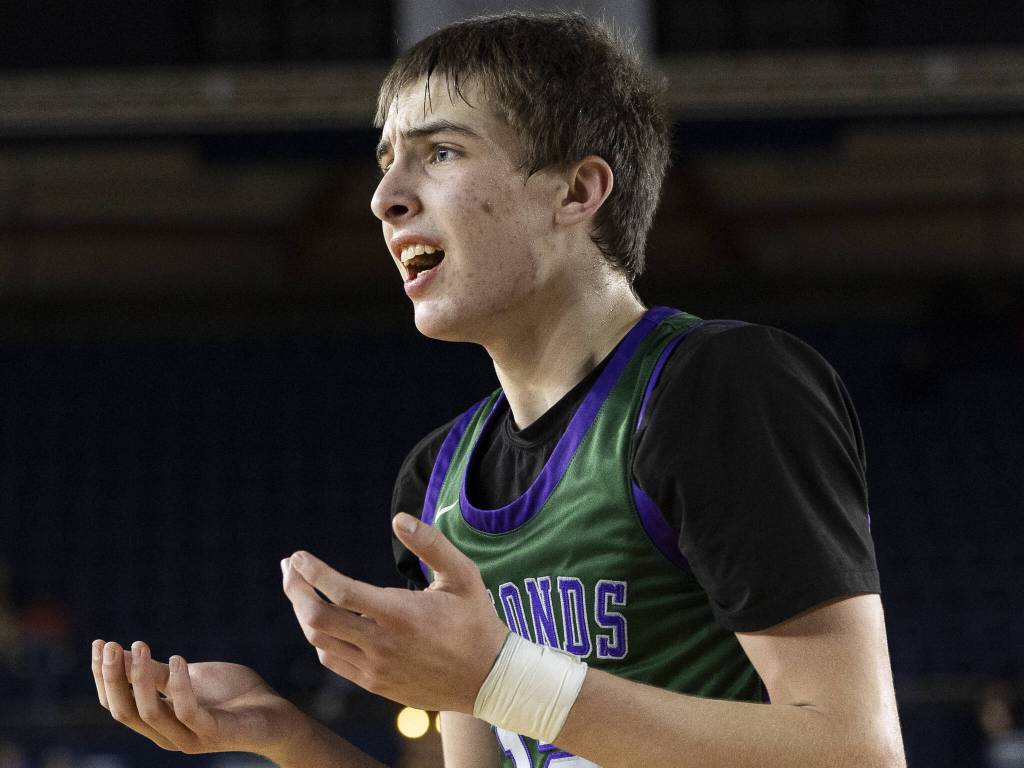 Edmonds-Woodways William Alseth reacts to a foul being called on him during the 3A boys semifinal game against Mt. Spokane on Friday, March 7, 2025 in Tacoma, Washington. (Olivia Vanni / The Herald)