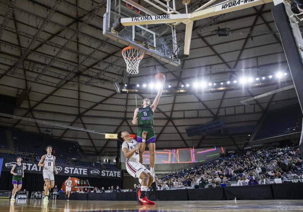 Edmonds-Woodways Cam Hiatt makes a layup during the 3A boys semifinal game against Mt. Spokane on Friday, March 7, 2025 in Tacoma, Washington. (Olivia Vanni / The Herald)