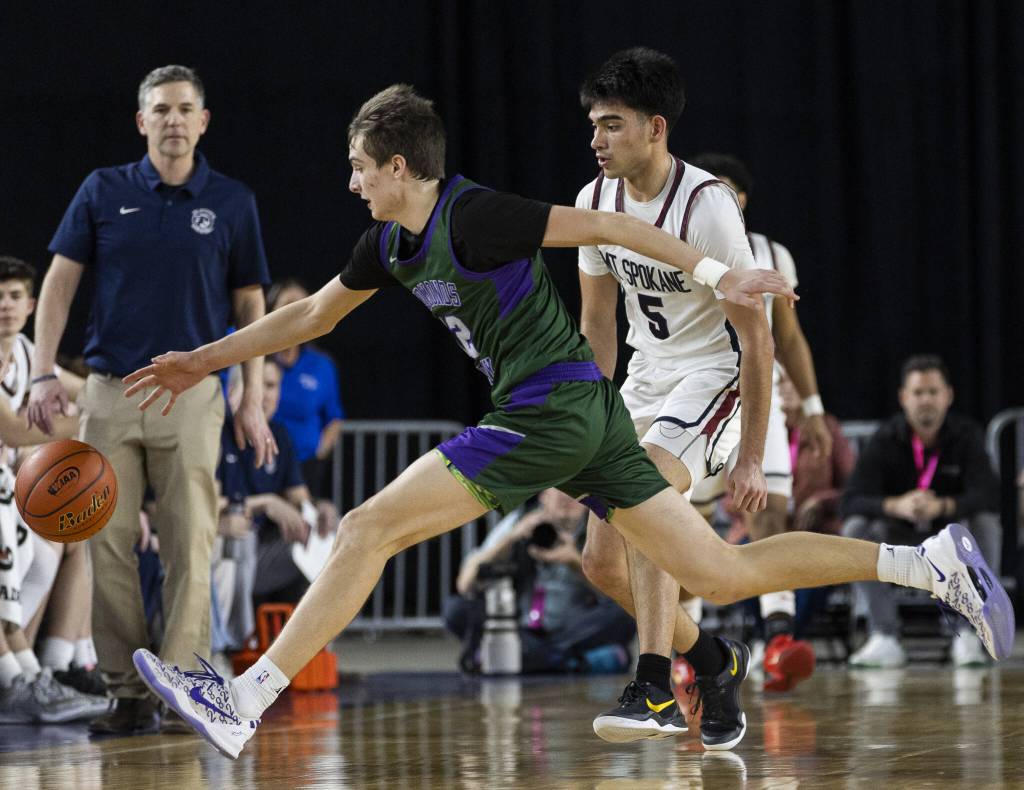 Edmonds-Woodways William Alseth runs after a loose ball during the 3A boys semifinal game against Mt. Spokane on Friday, March 7, 2025 in Tacoma, Washington. (Olivia Vanni / The Herald)