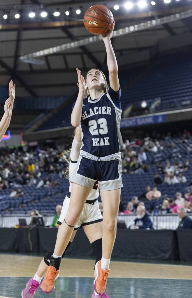 Glacier Peaks Lillian Riechelson makes a layup during the 4A girls semifinal game against Davis on Friday, March 7, 2025 in Tacoma, Washington. (Olivia Vanni / The Herald)