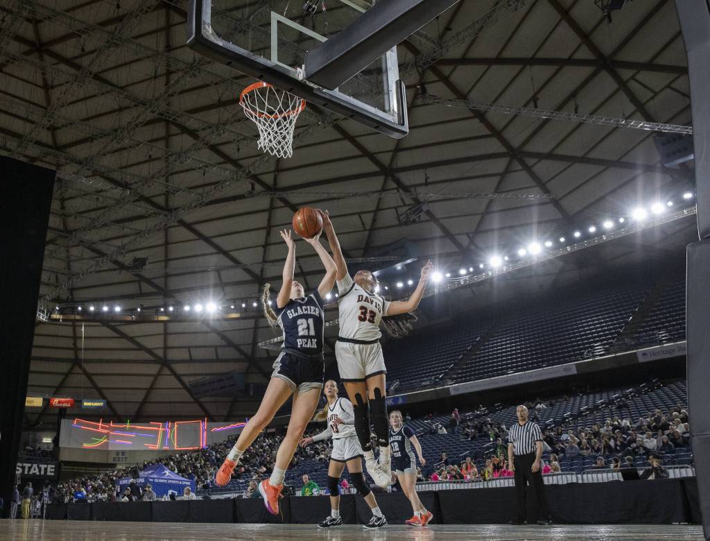 Glacier Peaks Rikki Miller shoots a layup during the 4A girls semifinal game against Davis on Friday, March 7, 2025 in Tacoma, Washington. (Olivia Vanni / The Herald)