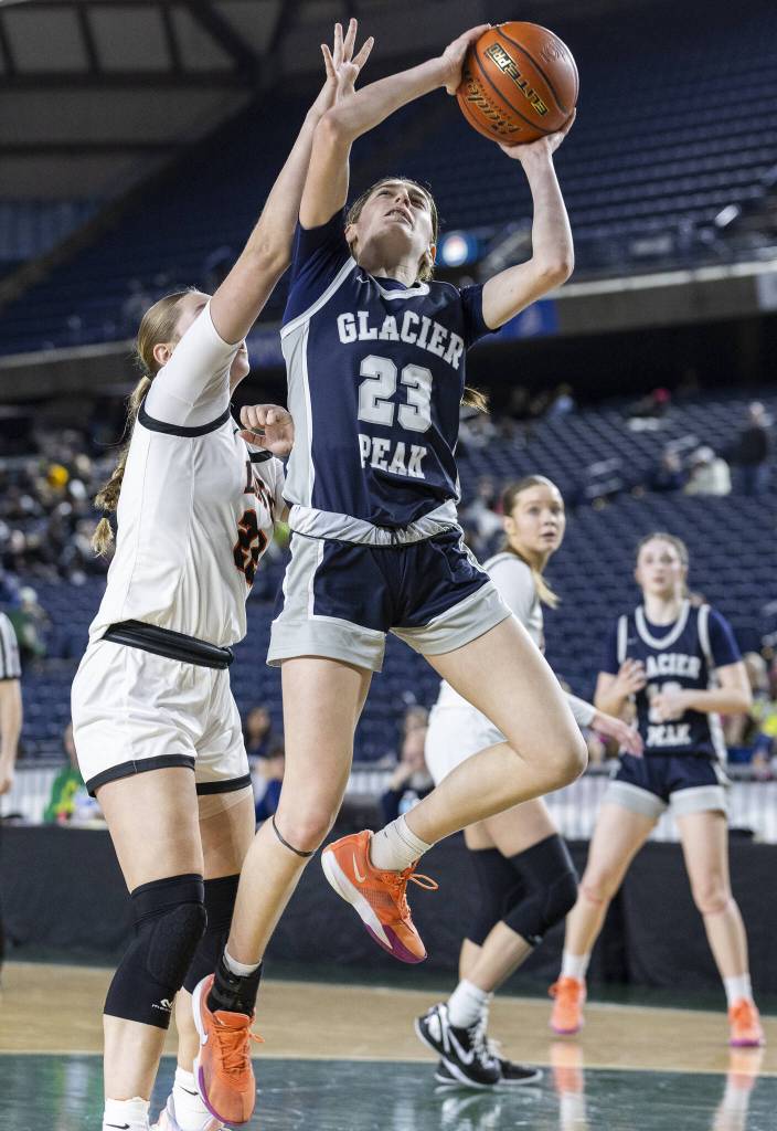 Glacier Peaks Lillian Riechelson shoots a layup during the 4A girls semifinal game against Davis on Friday, March 7, 2025 in Tacoma, Washington. (Olivia Vanni / The Herald)